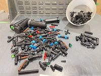 Overview of assorted drip fittings and emitters with large elbow and pop-up bodies