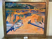 Straight-on view of framed painting showing artwork subject and signature