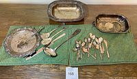Overview of all silver-plated platters, bowls, utensils and spoons