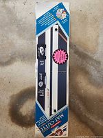 Top view of product packaging displaying mat cutter image and branding