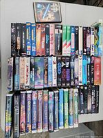 Overall view of both rows of VHS tapes on table