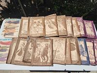 Group shot of all 20 sewing patterns on table