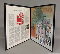 Full open panel showing both pages with text and stamps