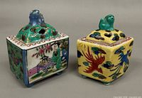 Both incense holders front view showing designs and finials