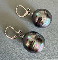 Pair of sterling silver leverback earrings with large iridescent baroque pearls