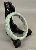 Bangle on stand showing overall colour and D-shape