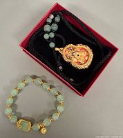 Bracelet and necklace in box overview