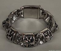 Bracelet closed showing clasp and skull links