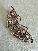 Front view of sterling butterfly brooch