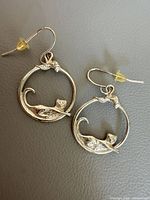 Front view of both earrings showing cat design and hooks