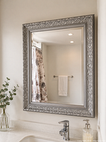 Full view of mirror mounted on wall above vanity