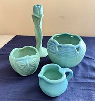 Group shot of all four Van Briggle turquoise pieces