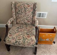 Front view of armchair and magazine rack