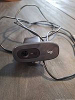 Front view of Logitech webcam showing lens, 720p label and Logi branding