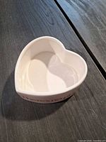 Top view of heart-shaped white ceramic dish