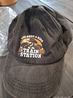 Front view of cap showing printed graphic and overall colour
