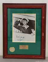 Full view of framed signed photograph