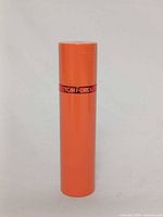 Full view closed atomizer front branding visible
