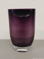 Front view of purple Arte Murano glass vase showing clear base