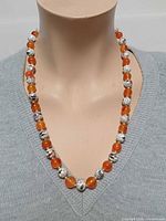 Necklace worn on mannequin showing bead pattern