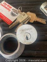 Close-up of Medeco cylinder face and keys