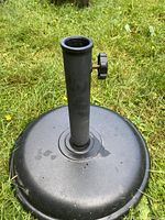 Umbrella stand side view showing tube and knob