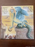 Front cover of Amanda Lear Never Trust A Pretty Face LP