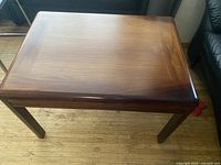 Top view showing rectangular veneered surface and finish