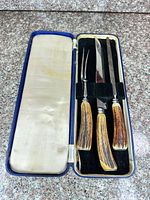 Closed view of case interior showing all three utensils in place