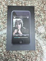Front of sealed retail box showing iPod touch image