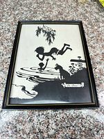 Front view of framed silhouette print