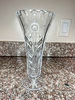 full view of crystal vase—trumpet form on pedestal
