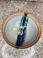 Top view showing glaze pattern and rim chip