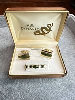 Full set in open Jade Dynasty box showing cufflinks and tie clip