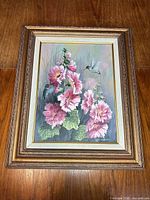 Full view of framed oil painting