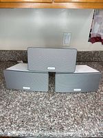 Front view of three Sonos Play:3 speakers