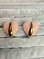 Front view of both earrings on display pad