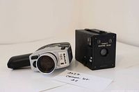 Kodak Target Brownie Six-20 camera beside Bauer C2M movie camera