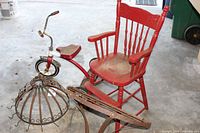 Group shot showing tricycle, high chair, dome pot holder, wall shelf