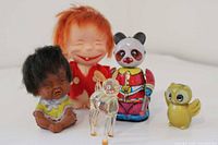 Group shot showing all five vintage toys