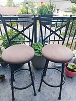 Front view of both bar stools on balcony