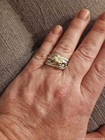stacked rings worn on finger showing combined appearance