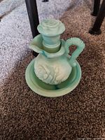 Perfume cruet bottle with stopper seated in underplate