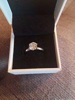 Solitaire engagement ring in box