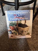 Front cover showing title and planter image