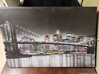 Front view showing full artwork, bridge and skyline