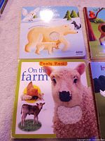 Front covers of Aquatic Animals and On the Farm books