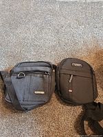 Front view of both purses showing size, color and pockets