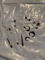 Group view of all tapers and crescent rings on sheet