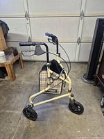 Side view of full walker showing frame, wheels, bag